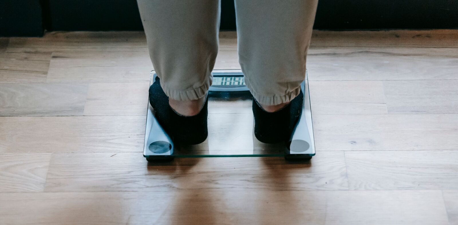 Feet on a bathroom scale - steady progress on a GLP-1 journey