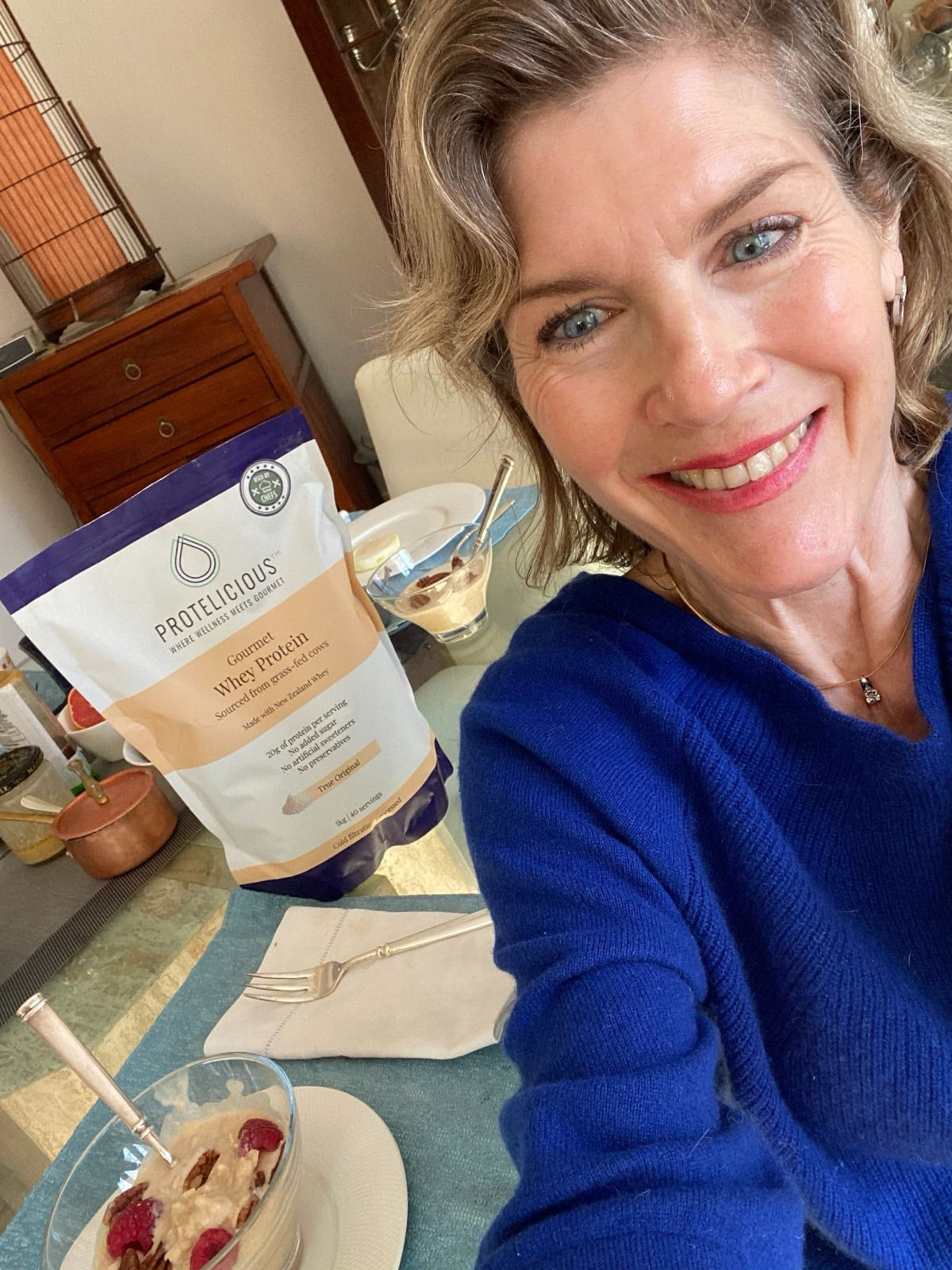 Sheila with ESSENTIAL gourmet whey, the daily ritual her family embraced